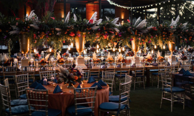 Event tables setup outside museum at night