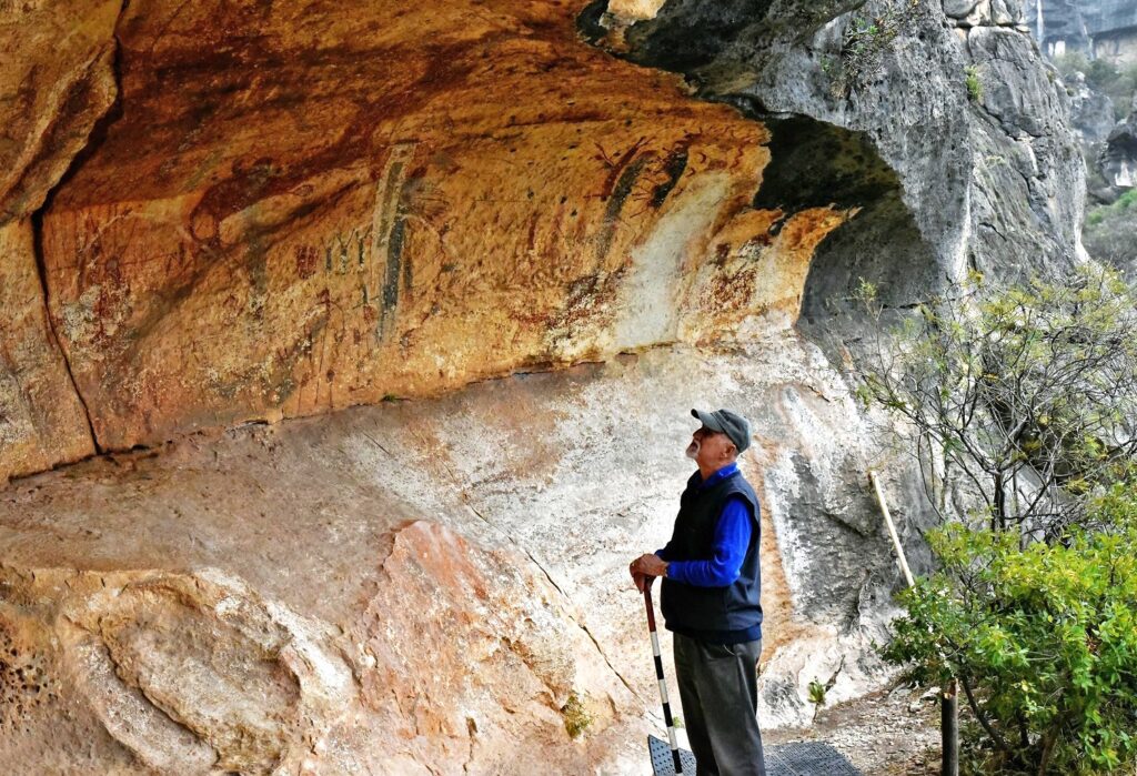 Man standing in cave