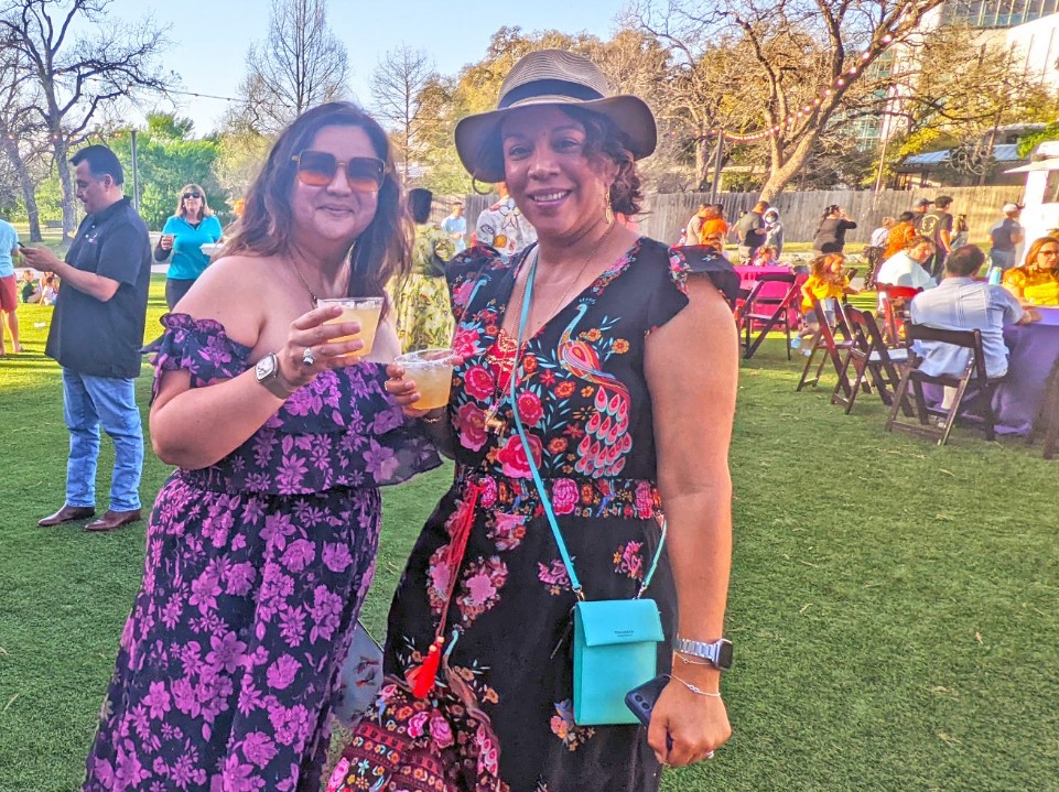 Two women smiling