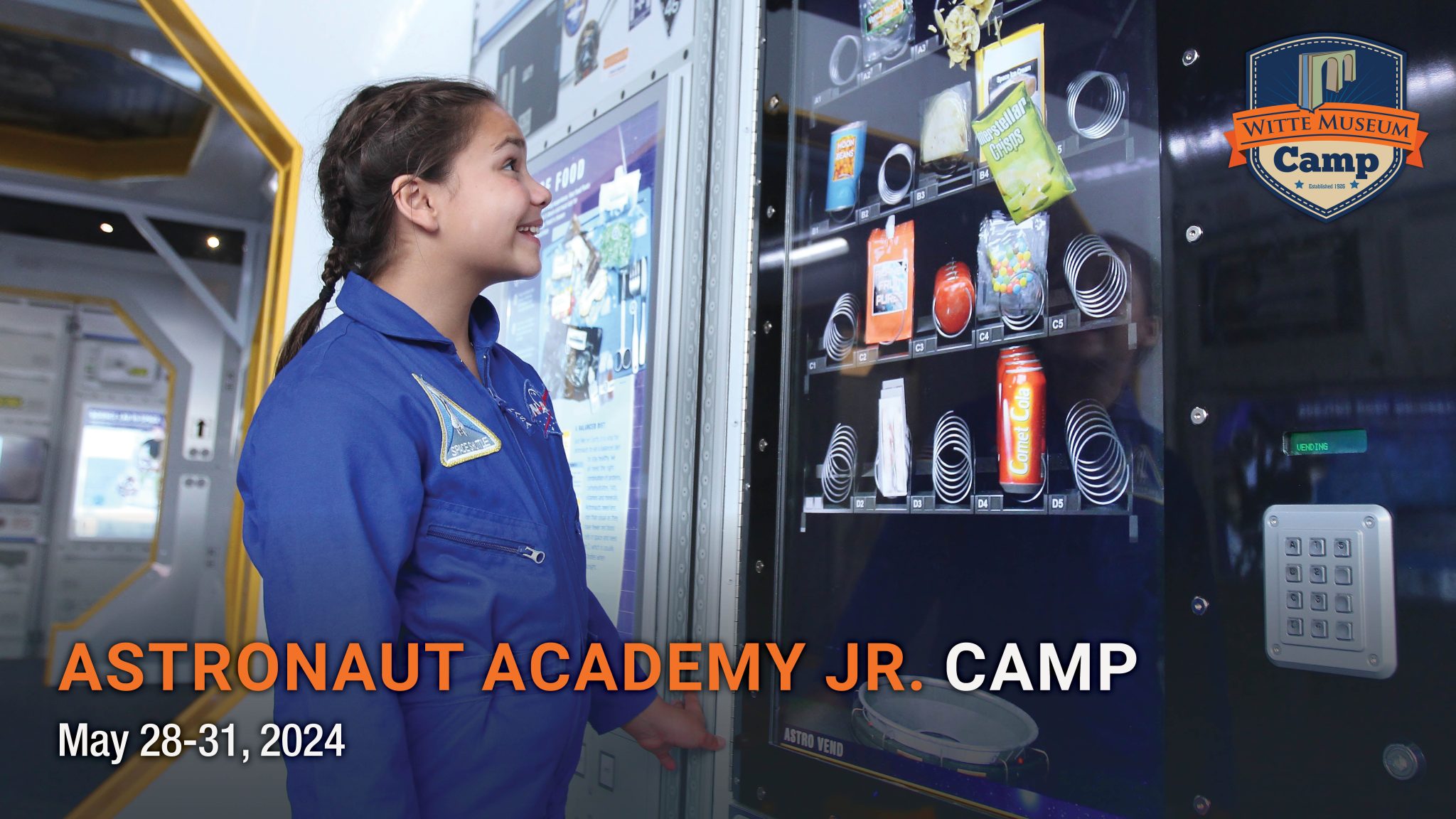 young girl looks at astronaut food.